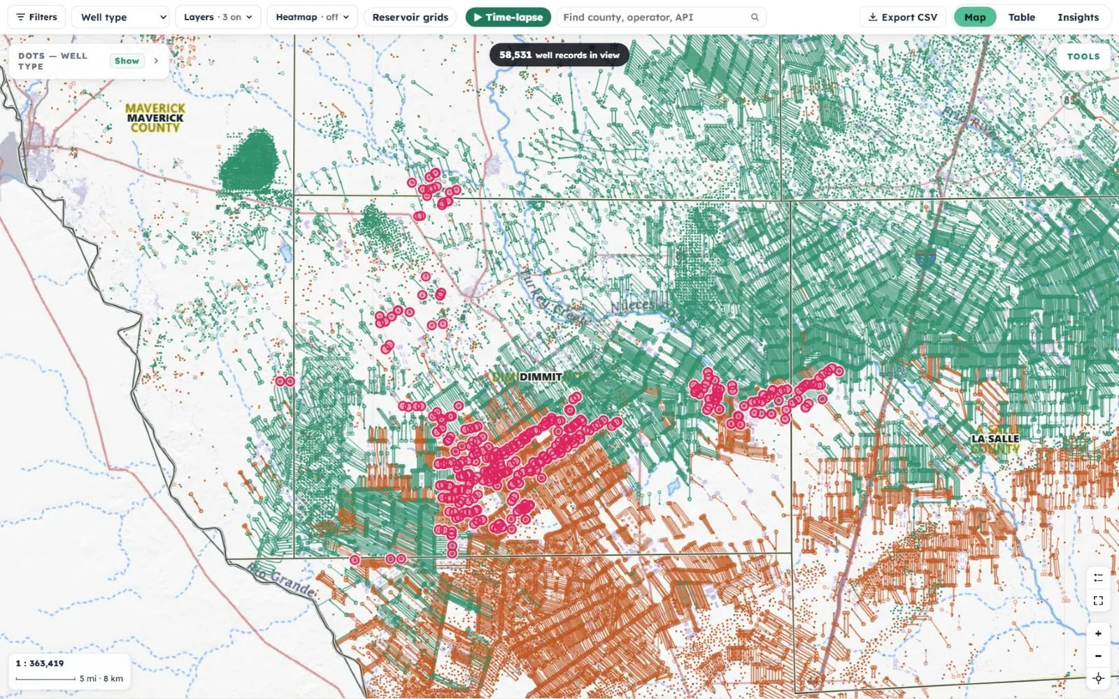 The live map over Dimmit County, Texas: the owner's wells ringed in pink among oil wells in green and gas wells in orange, with horizontal laterals drawn